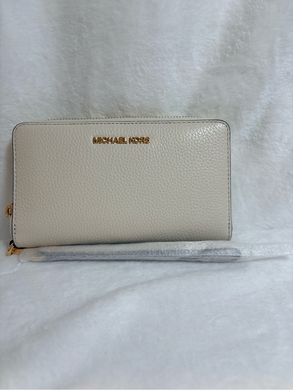 Michael Kors Jet Set Large Pebbled Leather Wallet (Color: Light Cream)
